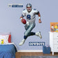 Life-Size Athlete + 2 Decals Quarterback with the Dallas Cowboys for 12 consecutive seasons and inducted in the Pro Football Hall of Fame in 2006, the IceMan can now be memorialized as one of the greats in your den or bedroom with this officially licensed NFL Troy Aikman: Legend removeable wall decal. Featuring the navy blue, metallic silver, royal blue, and white of America's Team no flags will be called for this durable decal that ensures Aikman can be making passes for seasons to come.