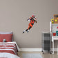 Giant Athlete + 2 Decals (37"W x 48"H) Your favorite running back has the ball and is zooming down the field in this dynamic, photo-real wall decal. Celebrate Nick Chubb's brilliant career, from winning SEC Freshman of the Year back at Georgia to his 2019 Pro Bowl appearance with the Browns. This is a high-quality gift for any fan who can't wait to see No. 24 dance through the defenders in his next game.