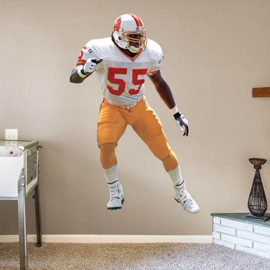 Life-Size Athlete + 2 Decals (51"W x 78"H) Immortalize The Sheriff's amazing career on your wall with this officially licensed decal. Derrick Brooks' amazing accolades range from Super Bowl champion to his 11 Pro Bowl appearances, and he has rightfully taken his place in the Pro Football Hall of Fame. This high-quality decal makes a great gift, and it can be removed and reaffixed to walls as you decide on the best place to show off your Bucs pride for this legend's impressive impact on the sport.