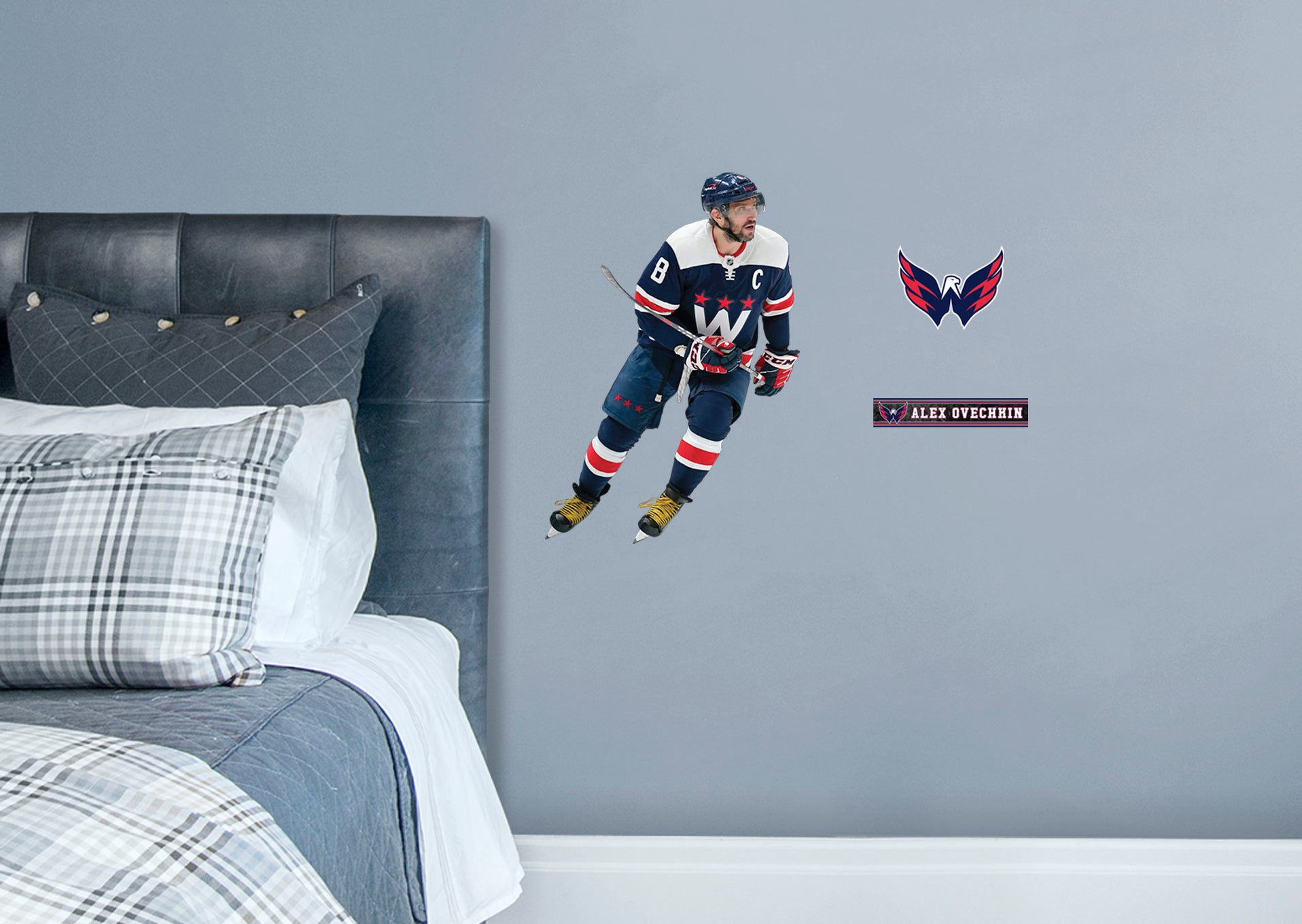 Large Athlete + 2 Decals NHL fans and Capitals fanatics alike love Alex Ovechkin, the clutch captain from Washington D.C., and now you can bring his skill to life in your own home! Seen here in action on the ice in the striking blue uniform, this durable, bold, and removable wall decal set will make the perfect addition to your bedroom, office, fan room, or any spot in your house! Let's Go Caps!