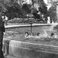 Policeman allows children to swim in the fountain at Grand Circus 1941 - Officially Licensed Detroit News Canvas