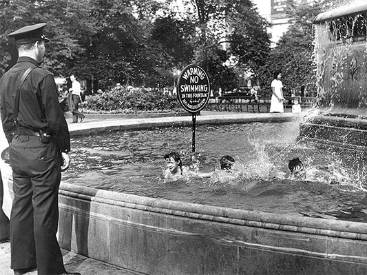Policeman allows children to swim in the fountain at Grand Circus 1941 - Officially Licensed Detroit News Canvas