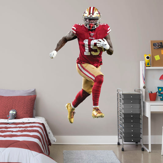 Life-Size Athlete + 2 Decals (42"W x 77"H) Deebo Samuel is one of the most exciting players in the NFL and you can show your support with this high-quality removable wall decal! Place this durable vinyl decal on any wall and wide receiver Deebo can dominate your room, office, or man cave like he helps the San Francisco 49ers dominate the league! This decal can be easily applied and removed on almost any surface, so this speedster can follow you everywhere you go! Let���s go, Niners!