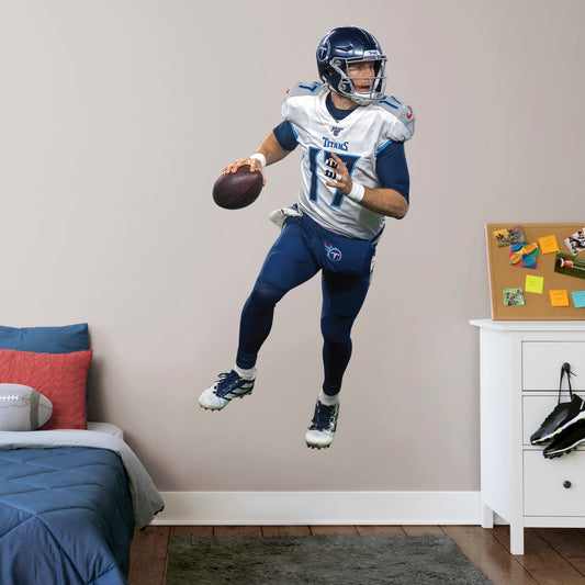 Life-Size Athlete + 2 Decals (40"W x 78"H) Show off your support for the NFL 2019 Comeback Player of the Year, Ryan Tannehill, with this officially licensed wall decal of the Tennessee Titan quarterback. Considered one of the best quarterbacks in the NFL, Tannessee is geared up to complete the pass and dominate the AFC South in any bedroom, sports bar, or fan cave with this high-quality wall decal in the iconic Titans navy blue and silver uniform. Nashville isn't just for music, Let's go Titans!
