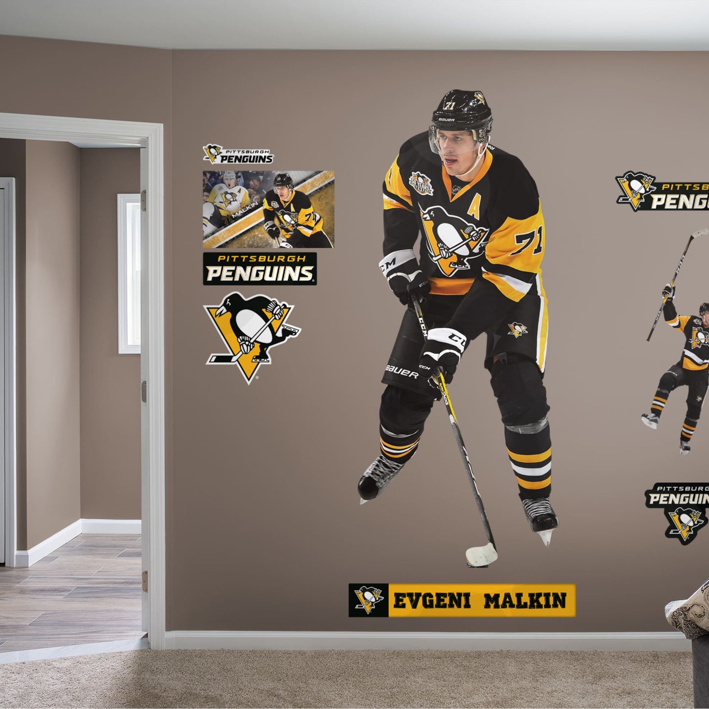 Athlete Only (32"W x 77"H) Before he became alternate captain for the Pittsburgh Penguins, Evgeni Malkin made a name for himself playing for his hometown club in Russia, the Metallurg Magnitogorsk. Drafted by the Penguins during the second round of 2014's NHL draft, Geno has since become one of the Steel City team's star standouts, and this durable, reusable wall decal makes No. 71 a regular fixture around the office, bar or bedroom.