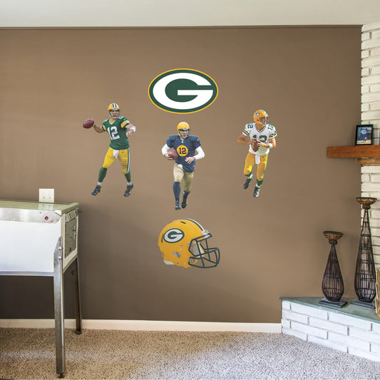 Kick a field goal in your office or entertainment room with this quality officially licensed NFL Aaron Rodgers removable vinyl wall decal featuring three different images of A-Rod in game-day action with the Green Bay Packers. Show rivals where your loyalties lie with this durable decal featuring the cheese gold and bay green colors of The Pack you've come to love. Go! You Packers, Go!