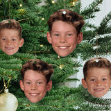 Cardboard Cutout Ornaments of kids faces in a tree
