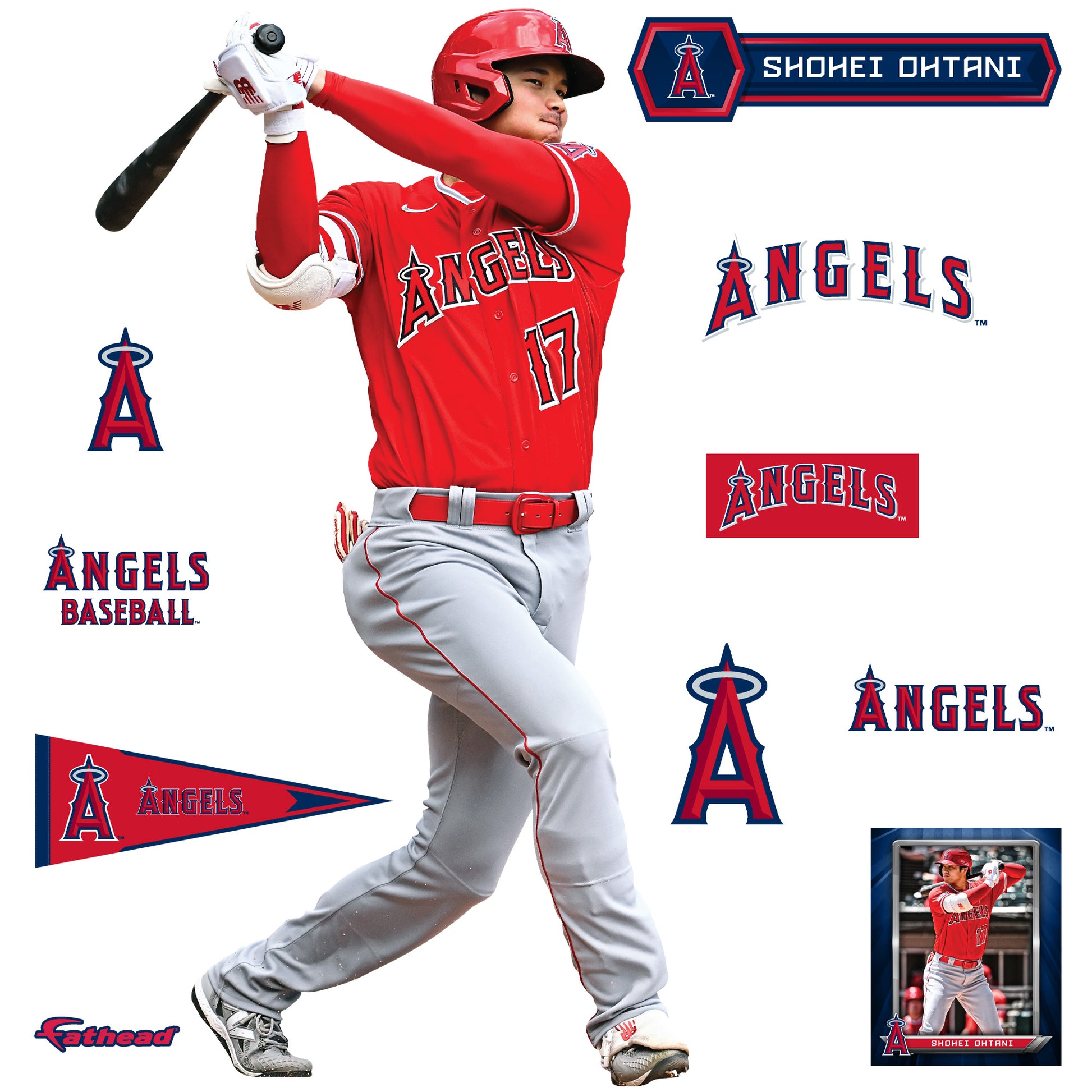 Shohei Ohtani of the Los Angeles Angels looks at an iPad in the in 2023