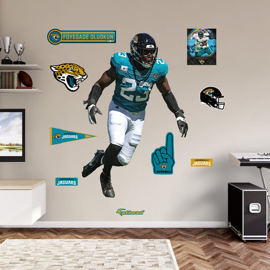 Jacksonville Jaguars: Foyesade Oluokun         - Officially Licensed NFL Removable     Adhesive Decal