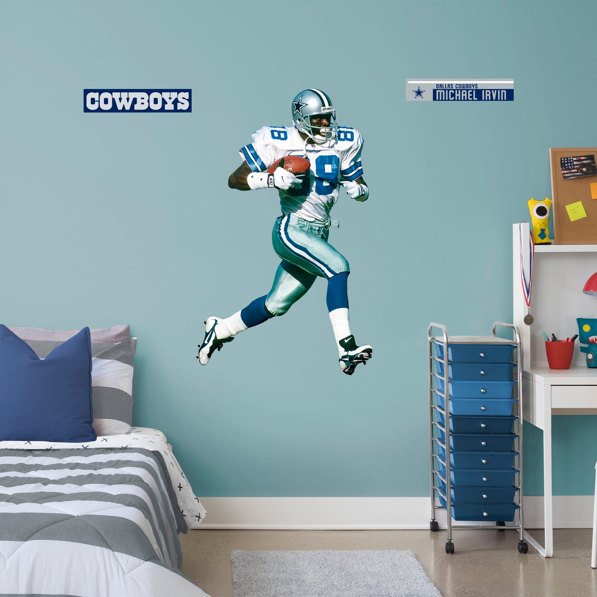 X-Large Athlete + 2 Decals You can show off your love for NFL legend and Hall of Famer Michael Irvin with this high-quality wall decal. Wearing his iconic number 88 Dallas Cowboys jersey, this decal shows off The Playmaker leaving defenders in the dust! Luckily, you won't have to worry about trying to tackle Irvin yourself - this wall decal can be easily applied and removed from almost any surface. How 'bout them Cowboys?!