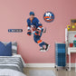Giant Athlete + 2 Decals (33.5"W x 51"H) Brock Nelson quickly made his mark in the NHL when he lead the Islanders to victory, and now he's skating to life in your office, bedroom, or fan room in this Officially Licensed NHL wall decal. New York fans and NHL fanatics alike will love the touch of action that Nelson brings, and this durable and removable wall decal will definitely stand up to the challenge, no matter how many times you move and restick it!