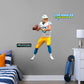 Giant Athlete + 2 Decals Bring the action of the NFL into your home with a wall decal of Justin Herbert! High quality, durable, and tear resistant, you'll be able to stick and move it as many times as you want to create the ultimate football experience in any room!