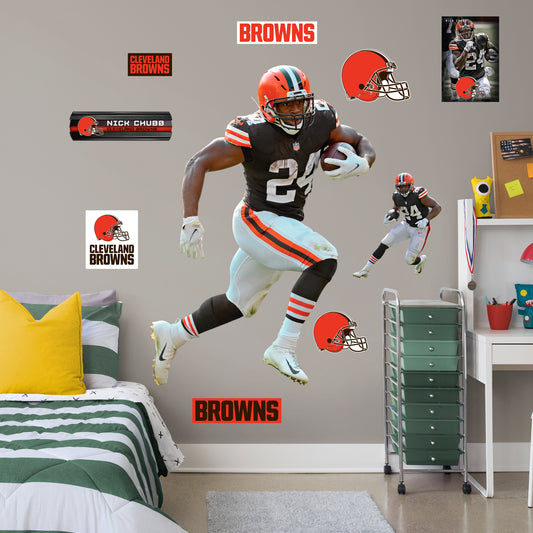 Life-Size Athlete + 9 Decals (51"W x 72.5"H) Bring the action of the NFL into your home with a wall decal of Nick Chubb! High quality, durable, and tear resistant, you'll be able to stick and move it as many times as you want to create the ultimate football experience in any room!