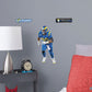Large Athlete + 2 Decals (8"W x 16"H) Rams fans know and love Aaron Donald as the star defensive tackle from their favorite team and now they can bring home that Los Angeles pride with an Aaron Donald Removable Wall Decal Set! This wall decal is vibrant and durable so you'll be able to stick it and move it over and over again. Go Rams!