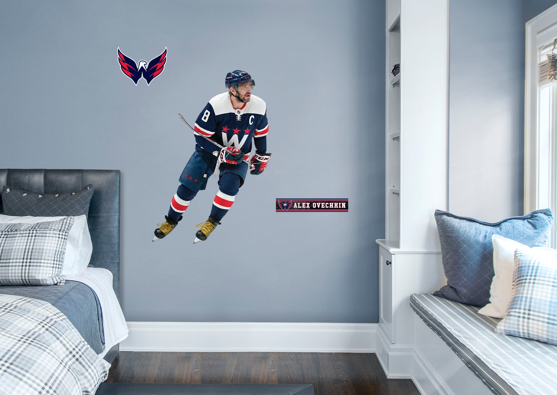 Giant Athlete + 2 Decals NHL fans and Capitals fanatics alike love Alex Ovechkin, the clutch captain from Washington D.C., and now you can bring his skill to life in your own home! Seen here in action on the ice in the striking blue uniform, this durable, bold, and removable wall decal set will make the perfect addition to your bedroom, office, fan room, or any spot in your house! Let's Go Caps!