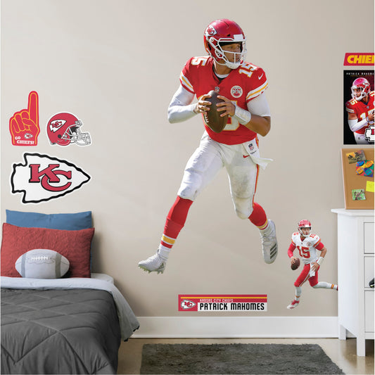 Life-Size Athlete + 10 Decals (42"W x 77"H) Chiefs fans understand "You Gotta Fight for Your Right To Party," but QB Patrick Mahomes makes winning look easy. The man they call Showtime led KC to the ultimate victory celebration at Super Bowl LIV. Now you can turn your home or office into a Sea of Red with a Patrick Mahomes Removable Wall Decal Collection. The sturdy vinyl, life-size version of the MVP would look good on a bedroom or home office wall. Go ahead, party on!