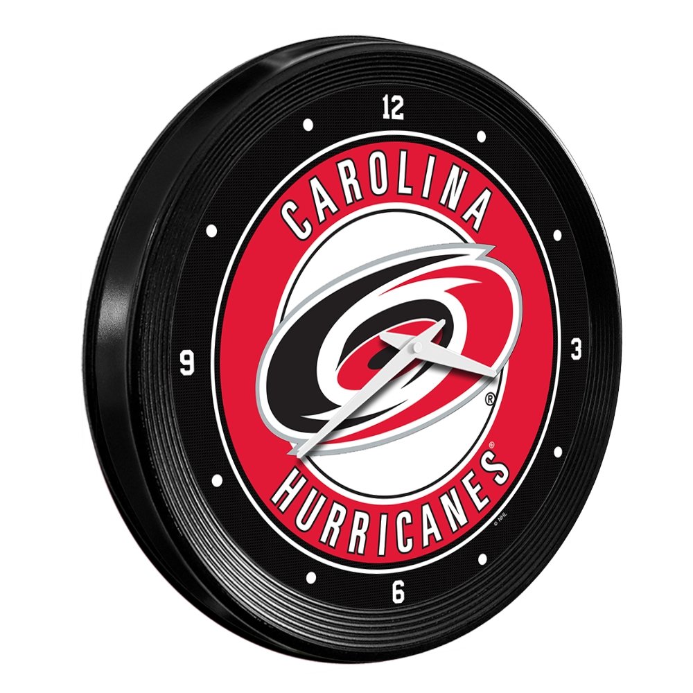 Carolina Hurricanes: Ribbed Frame Wall Clock - The Fan-Brand