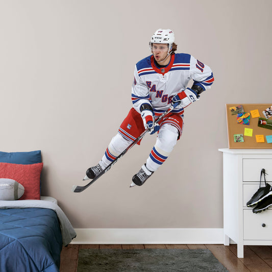 Life-Size Athlete + 12 Decals (62"W x 71"H) The opposing goaltender had better be in position when Artemi Panarin takes the ice in this officially licensed NHL wall decal. The left wing for the New York Rangers has been making noise throughout the league since going undrafted and then becoming one of the NHL's top rookies a few years ago. This high-quality decal of the Breadman is the perfect addition to any Rangers fan's game room or bar, and can be easily removed in case it needs to be regifted.
