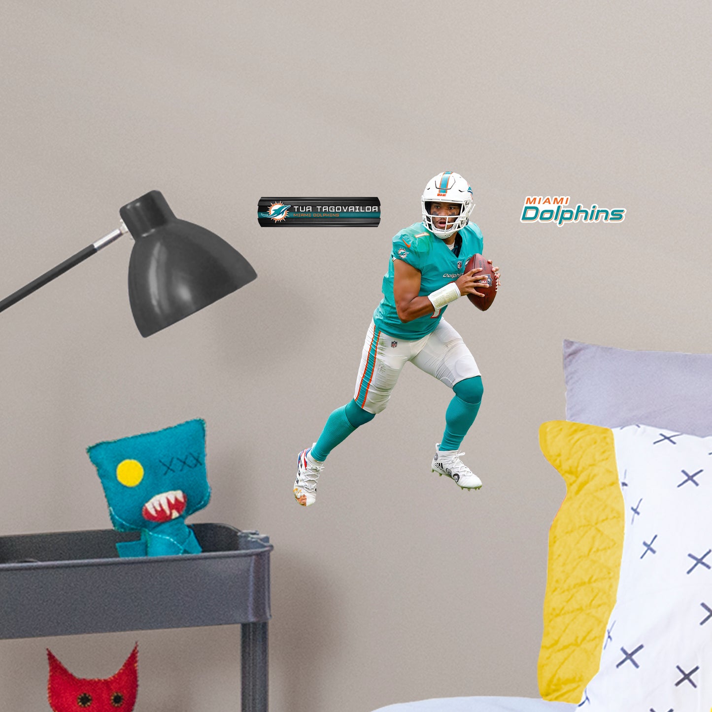 Large Athlete + 2 Decals (10"W x 16"H) Bring the action of the NFL into your home with a wall decal of Tua Tagovailoa! High quality, durable, and tear resistant, you'll be able to stick and move it as many times as you want to create the ultimate football experience in any room!