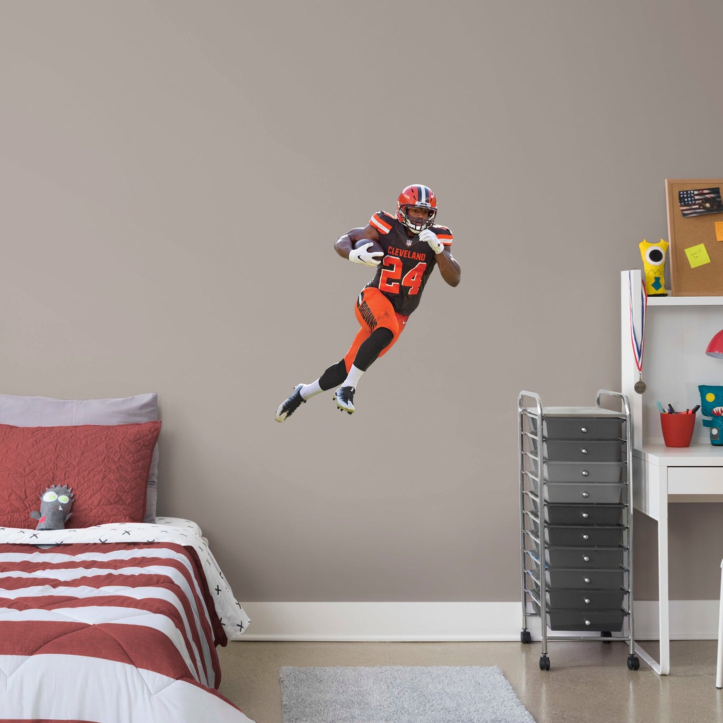 Giant Athlete + 2 Decals (37"W x 48"H) Your favorite running back has the ball and is zooming down the field in this dynamic, photo-real wall decal. Celebrate Nick Chubb's brilliant career, from winning SEC Freshman of the Year back at Georgia to his 2019 Pro Bowl appearance with the Browns. This is a high-quality gift for any fan who can't wait to see No. 24 dance through the defenders in his next game.