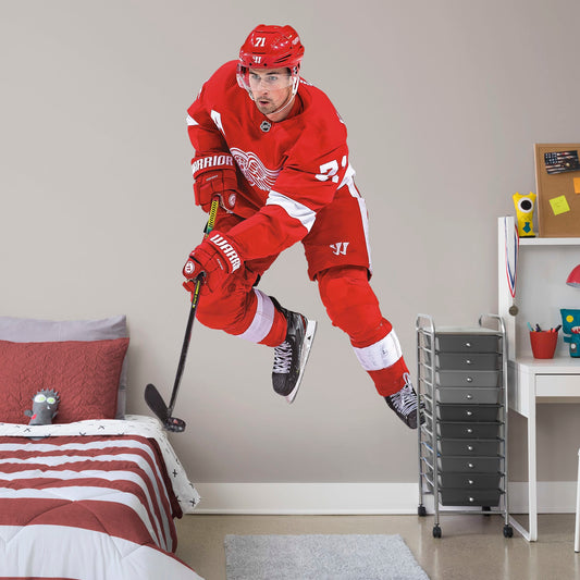 Life-Size Athlete + 2 Decals (52"W x 73"H) From the University of Michigan to the Detroit Red Wings, Dylan Larkin has been a fan favorite for years, and now you can bring him to life in your own home. Larkin leads on the ice and is sure to bring that excitement to your bedroom, fan room, or office, it's almost as good as being at Little Caesars Arena!