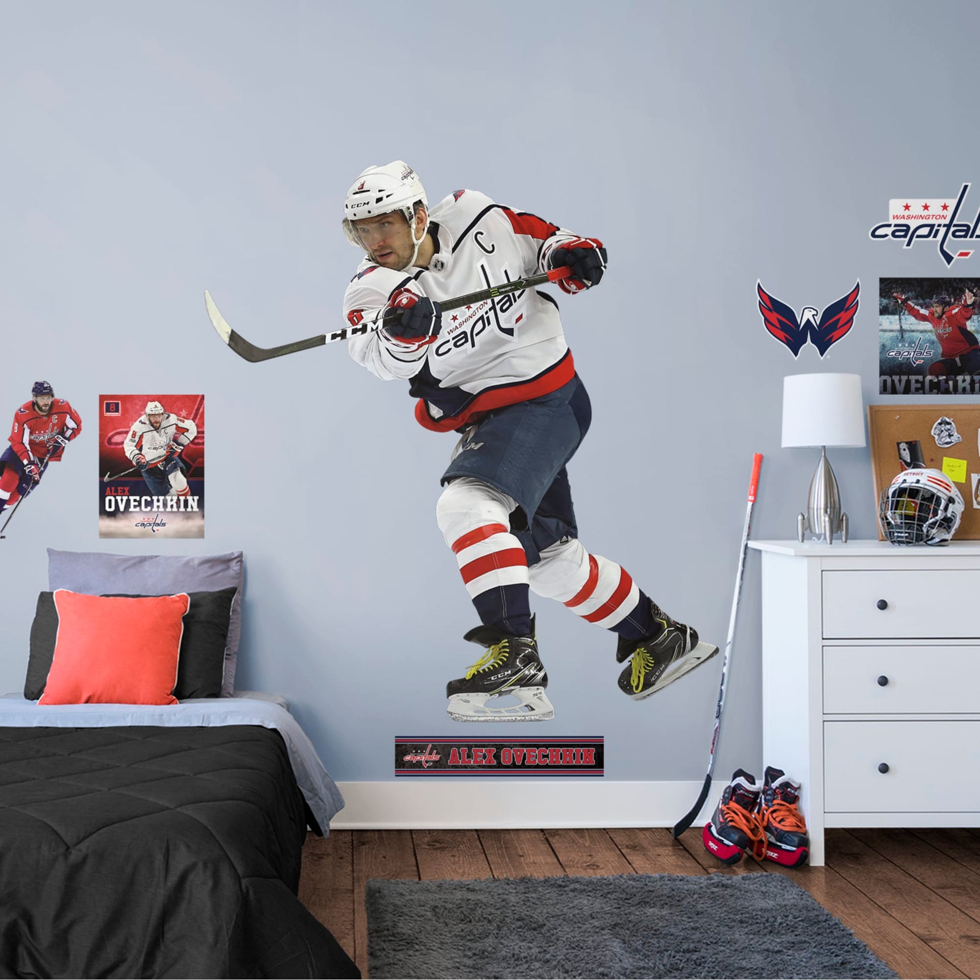Life-Size Athlete + 2 Decals (67"W x 74"H) History in in the making! One look at his vicious one-timer, and you know Alex Ovechkin is a living legend on ice. Well on his way to being the greatest goal scorer in the NHL, Ovi is giving Gretzky a run for his money. Cheer on the Capitals and your favorite left winger with a high-grade vinyl reusable decal of the Great Eight.