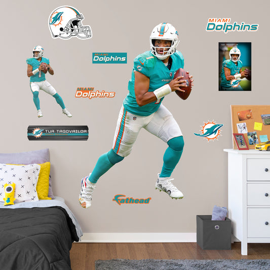 Life-Size Athlete + 9 Decals (47"W x 76"H) Bring the action of the NFL into your home with a wall decal of Tua Tagovailoa! High quality, durable, and tear resistant, you'll be able to stick and move it as many times as you want to create the ultimate football experience in any room!