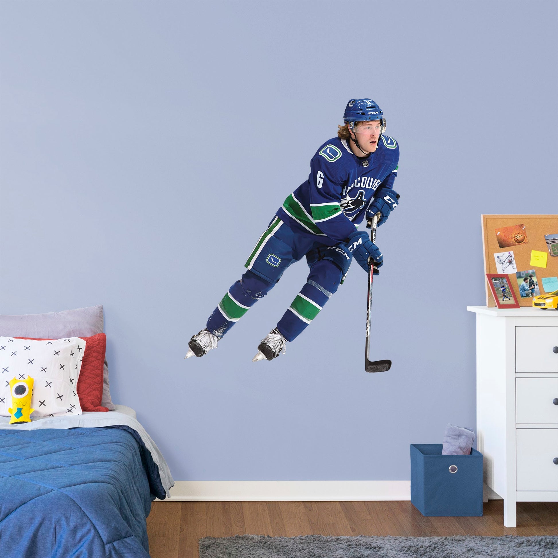 Giant Athlete + 2 Decals (41"W x 51"H) Everyone loves Brock Boeser, the first round pick from the 2015 draft, and now you can bring him to life in your bedroom, office, or fan room with this Officially Licensed NHL Wall Decal. Skating to life in the Canucks home uniform, this removable wall decal of Boeser is sure to bring some action to your home, no matter how many times you need to move and restick it!