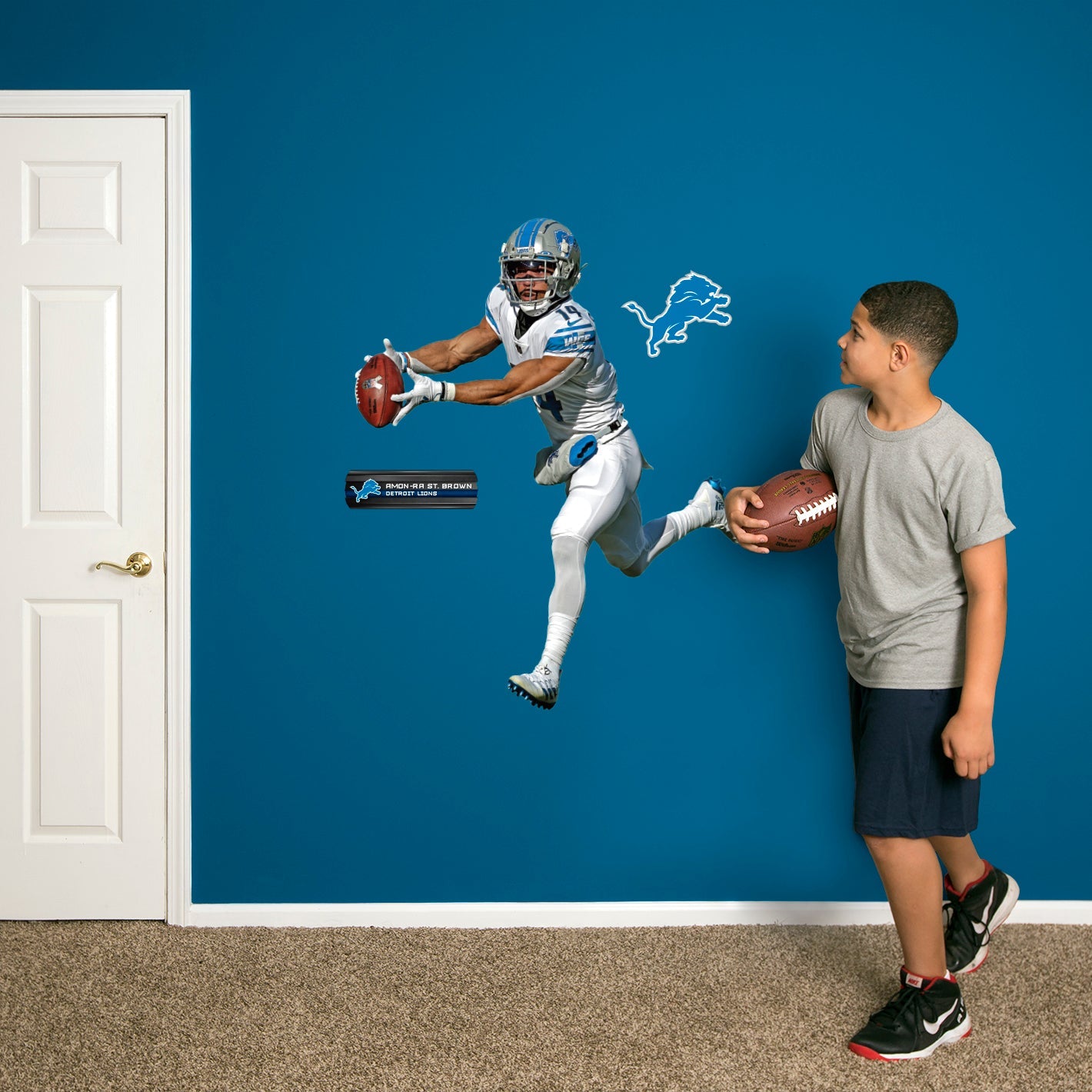 Detroit Lions: Amon-Ra St. Brown Catch - Officially Licensed NFL Removable Adhesive Decal