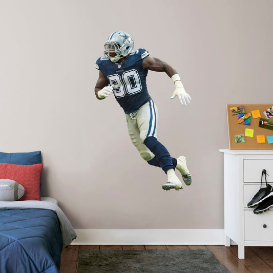 Giant Athlete + 2 Decals (31"W x 51"H) Show your support for one of the best defensive linemen in the NFL with this reusable DeMarcus Lawrence wall decal! This two-time Pro Bowler is quickly climbing his way up the all-time sacks list and is already one of the all-time great Dallas Cowboys players. This high-quality decal can be easily applied, removed, and reused so your support for DeMarcus Lawrence can follow you wherever you go!