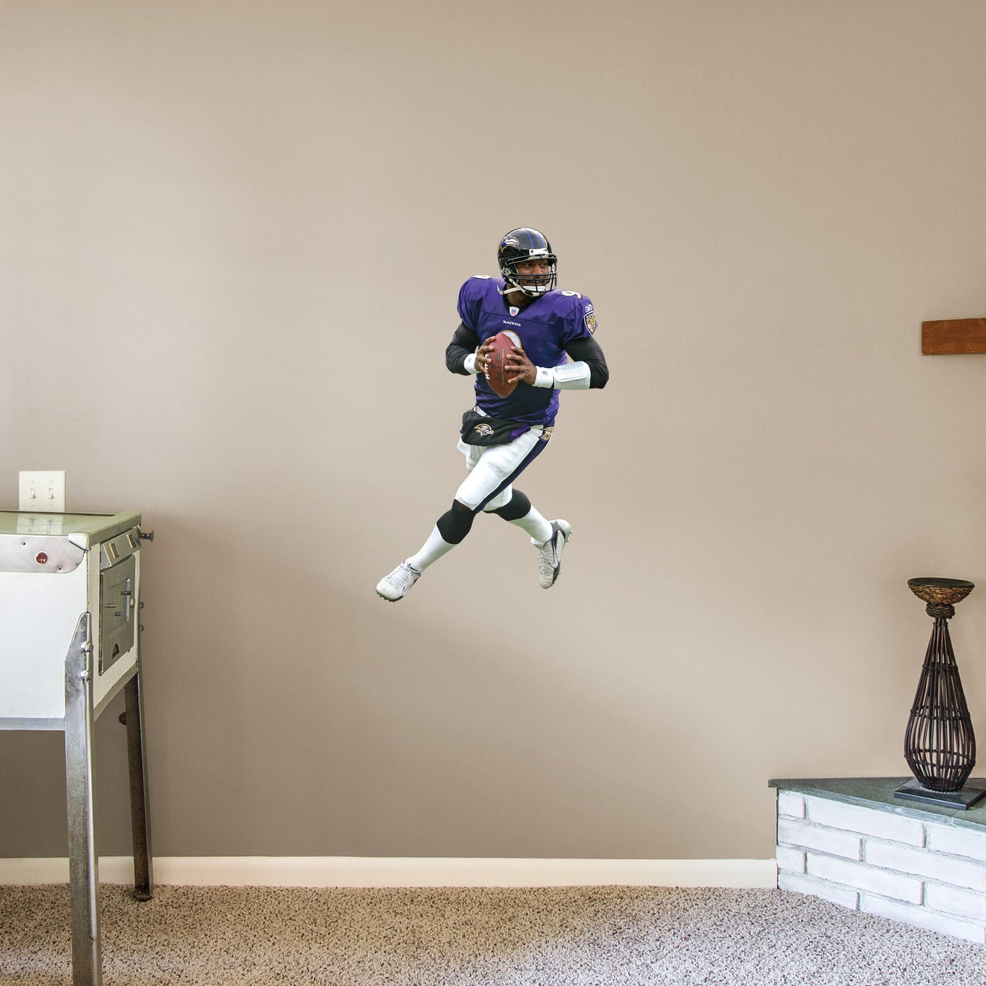 X-Large Athlete + 2 Decals (24"W x 38.5"H) Bring the action of the NFL into your home with a wall decal of Steve McNair! High quality, durable, and tear resistant, you'll be able to stick and move it as many times as you want to create the ultimate football experience in any room!