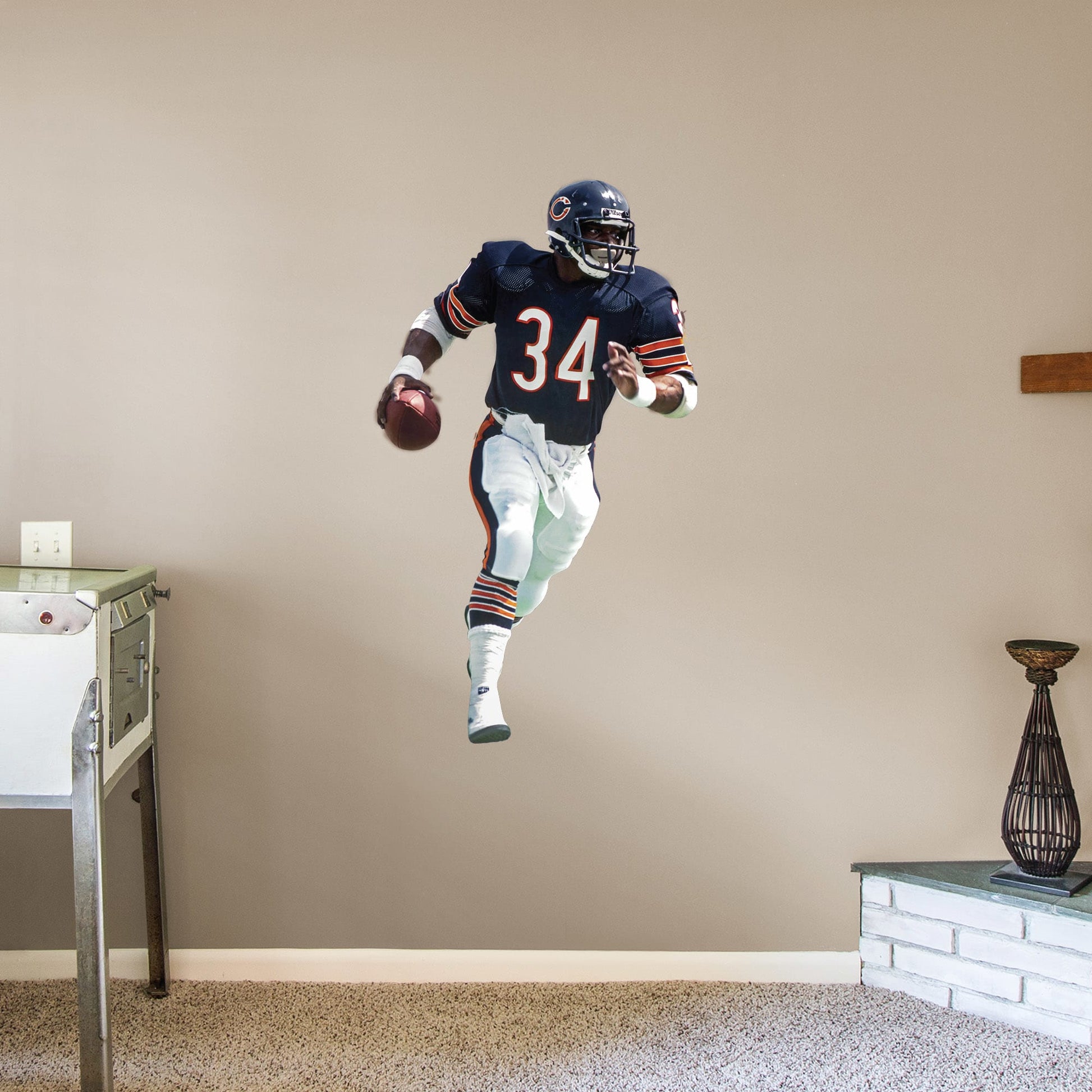 Giant Athlete + 2 Decals (29"W x 51"H) They called him Sweetness, a player whose heart was as big as his talent. A 9-time Pro Bowler and 1985 Super Bowl champion, Walter Payton widely is regarded as one of the greatest running backs of all time. Now fans of Da Bears can honor the late Hall of Famer with a removable wall decal set. Perfect for a bedroom or bonus room, the heavy-duty vinyl decals are easy to attach and remove. Bear down!