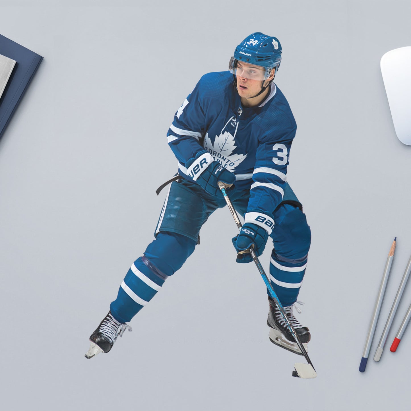 Toronto fans know that the opposing team should be scared when Auston Matthews hits the ice, and now you can bring that action to life in your own home with this Officially Licensed NHL Removable Wall Decal! Seen here in the Toronto home uniform, this removable and reusable decal of Matthews is bold and durable, making it the perfect addition to your bedroom, office, or fan room. Go Maple Leafs!