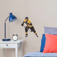 Large Athlete + 2 Decals (12"W x 15"H) Bruins fans know that the opposing team should be scared when Brad Marchand hits the ice, and now you can bring that action to life in your own home with this Officially Licensed NHL Removable Wall Decal! Seen here in the Boston home uniform, this removable and reusable decal of Marchand is bold and durable, making it the perfect addition to your bedroom, office, or fan room. Go Bruins!