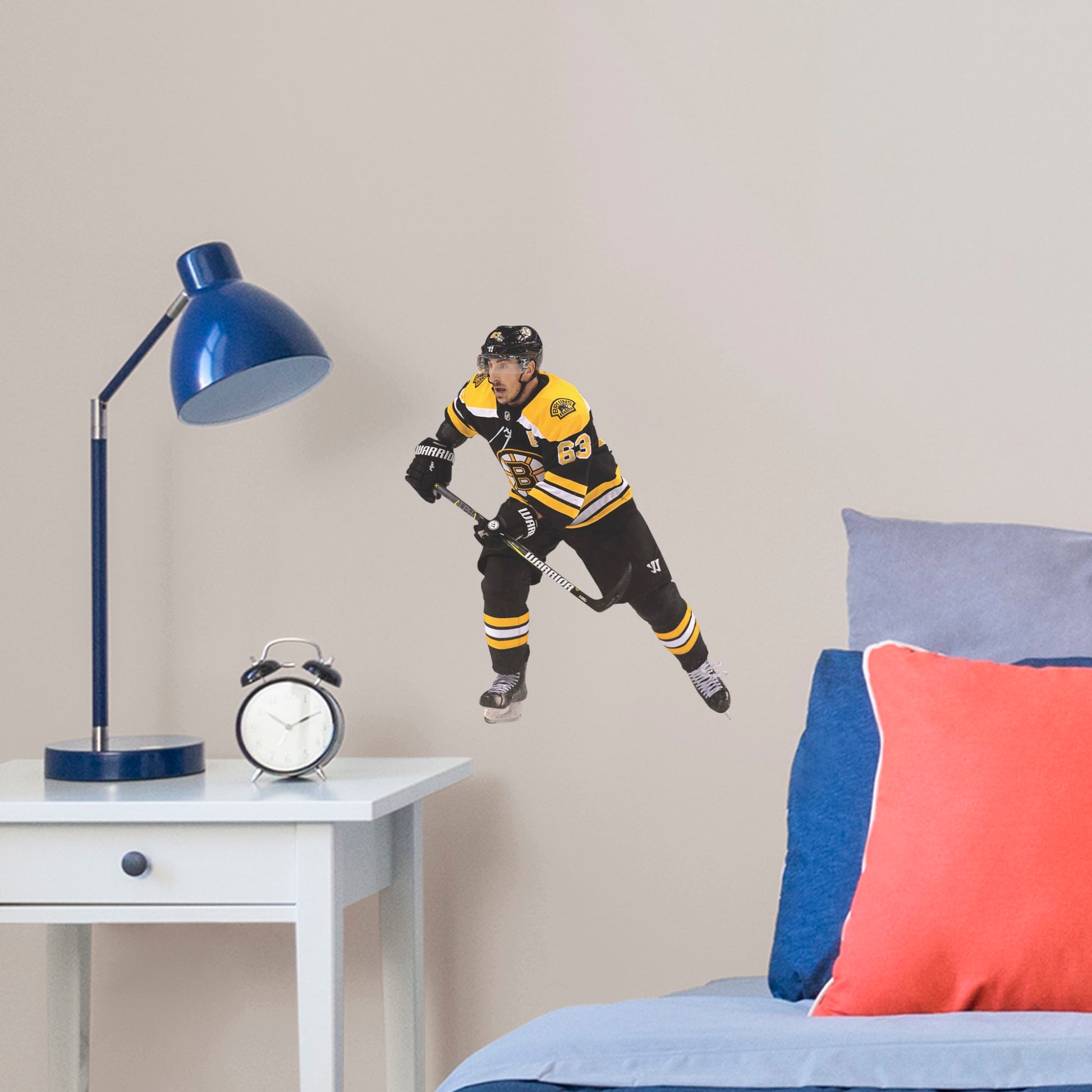 Large Athlete + 2 Decals (12"W x 15"H) Bruins fans know that the opposing team should be scared when Brad Marchand hits the ice, and now you can bring that action to life in your own home with this Officially Licensed NHL Removable Wall Decal! Seen here in the Boston home uniform, this removable and reusable decal of Marchand is bold and durable, making it the perfect addition to your bedroom, office, or fan room. Go Bruins!