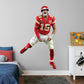 Life-Size Athlete + 2 Decals (45"W x 78"H) Celebrate the Chiefs' epic Super Bowl LIV win over the 49ers with this high-quality, repositionable decal of MVP quarterback Patrick Mahomes celebrating the victory. Featuring plenty of the Chiefs' red and gold, this enthusiastic Magic Mahomes decal will brighten every day of your week. It's perfect for dorms, bedrooms, and sports bars because this durable, reusable Mahomes decal only damages the competition, not your walls.