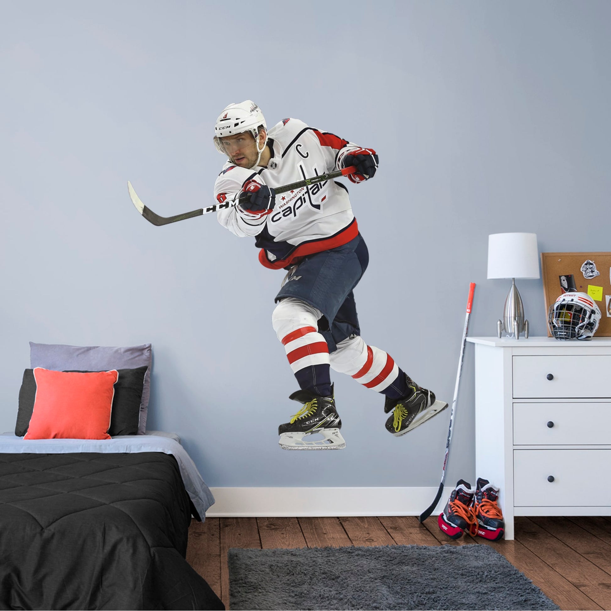 Life-Size Athlete + 9 Decals (67"W x 74"H) History in in the making! One look at his vicious one-timer, and you know Alex Ovechkin is a living legend on ice. Well on his way to being the greatest goal scorer in the NHL, Ovi is giving Gretzky a run for his money. Cheer on the Capitals and your favorite left winger with a high-grade vinyl reusable decal of the Great Eight.