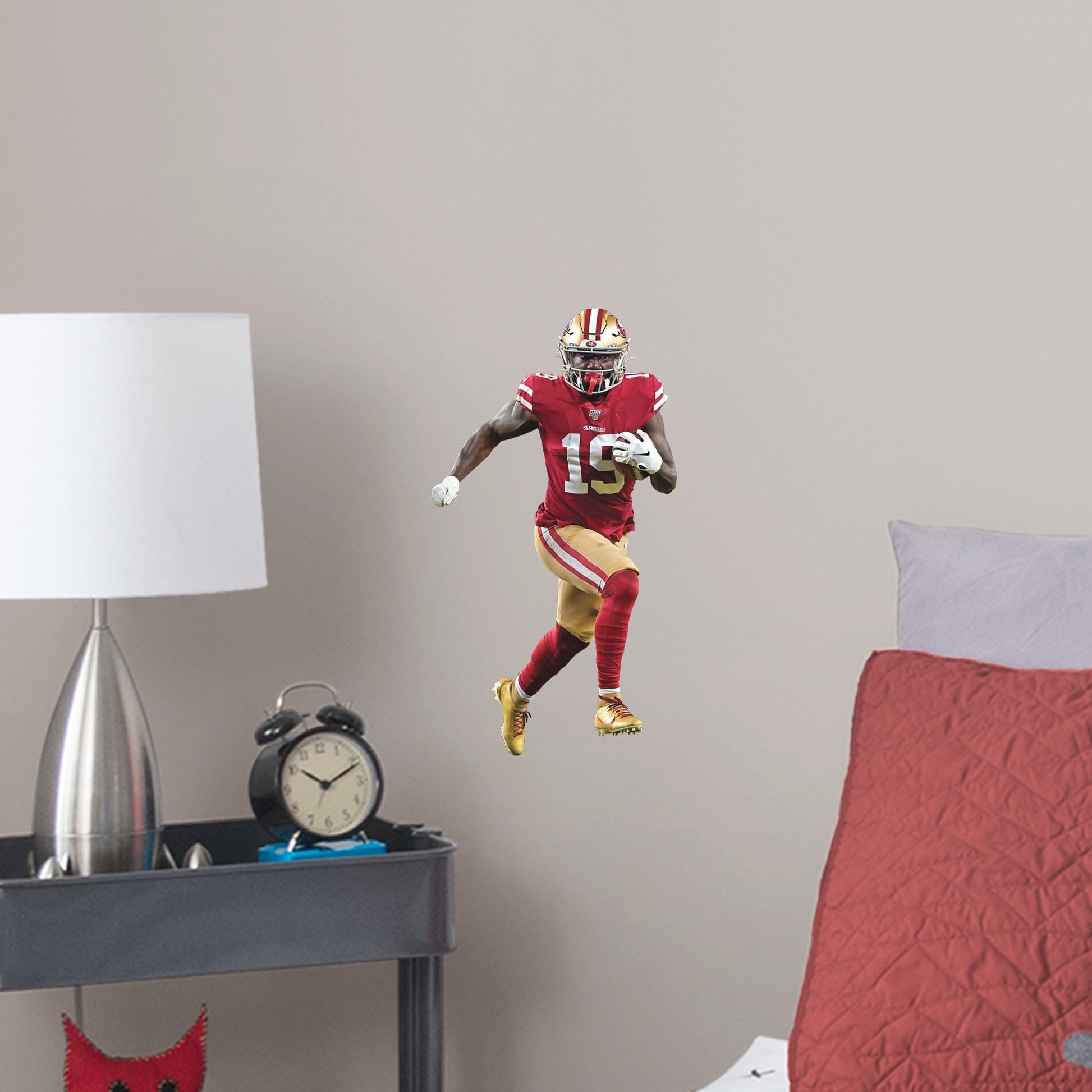 Large Athlete + 2 Decals (9"W x 17"H) Deebo Samuel is one of the most exciting players in the NFL and you can show your support with this high-quality removable wall decal! Place this durable vinyl decal on any wall and wide receiver Deebo can dominate your room, office, or man cave like he helps the San Francisco 49ers dominate the league! This decal can be easily applied and removed on almost any surface, so this speedster can follow you everywhere you go! Let's go, Niners!