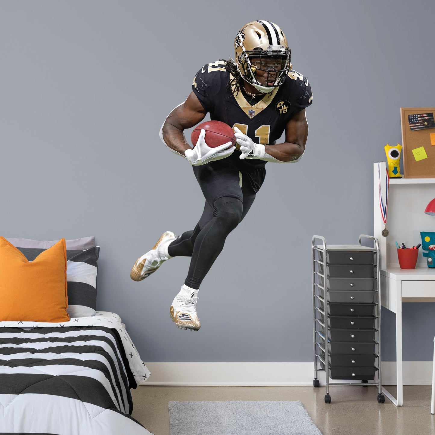 Large Athlete + 2 Decals (10"W x 17"H) Who Dat! Running back Alvin Kamara of the New Orleans Saints had a stellar start to his NFL career with an impressive 32 TDs in his first two seasons - an MVP in the making. Deck your walls in black and gold with a high-grade vinyl decal of the Saints' #41. It won't fade or tear, so remove it and reuse it wherever you watch the big game. Geaux Saints!