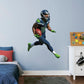 Giant Athlete + 2 Decals (34"W x 50"H) Bring the action of the NFL into your home with a wall decal of Tyler Lockett! High quality, durable, and tear resistant, you'll be able to stick and move it as many times as you want to create the ultimate football experience in any room!