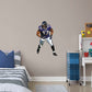 X-Large Athlete + 2 Decals (23"W x 38"H) He’s the second linebacker ever to win the NFL’s Super Bowl MVP Award, and now, Brickwall, a.k.a. Ray Lewis, is ready for the bedroom, living room or locker room. This rugged, removable wall decal features the full figure of two-time Super Bowl champion No. 52 in his black, purple and metallic gold Baltimore Ravens best. Go Ravens!
