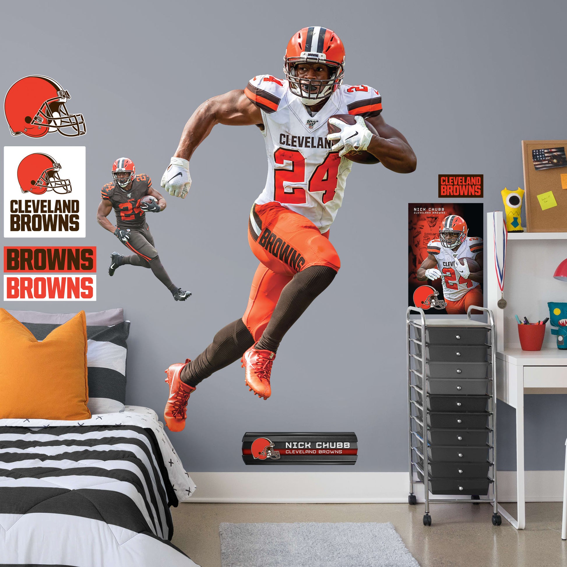Life-Size Athlete + 10 Decals (48"W x 76"H) Heir to a Cleveland running back a tradition that includes the legendary Jim Brown, Nick Chubb is the new Browns powerhouse. Blessed with a blend of power, balance, and speed, the man they call Old School is a nightmare for AFC North foes. Now Dawg Pound fans can salute the former Georgia All-American with this removable wall decal collection. The premium vinyl decals are as durable as Chubb himself and ready to charge through a bonus room, bedroom, or dorm. Woof!