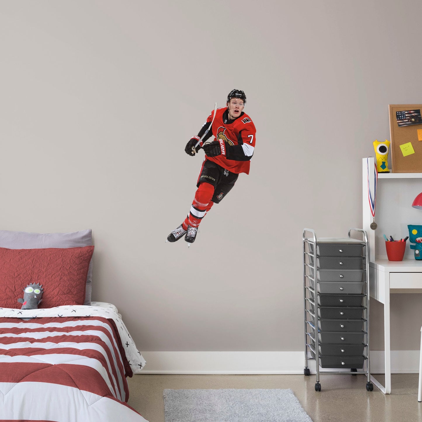 X-Large Athlete + 2 Team Decals (22"W x 38"H) Power forward Brady Tkachuk quickly made his mark in the NHL when he lead the Senators to victory, and now he's skating to life in your office, bedroom, or fan room in this Officially Licensed NHL wall decal. Ottawa fans and NHL fanatics alike will love the touch of action that Tkachuk brings, and this durable and removable wall decal will definitely stand up to the challenge, no matter how many times you restick it!