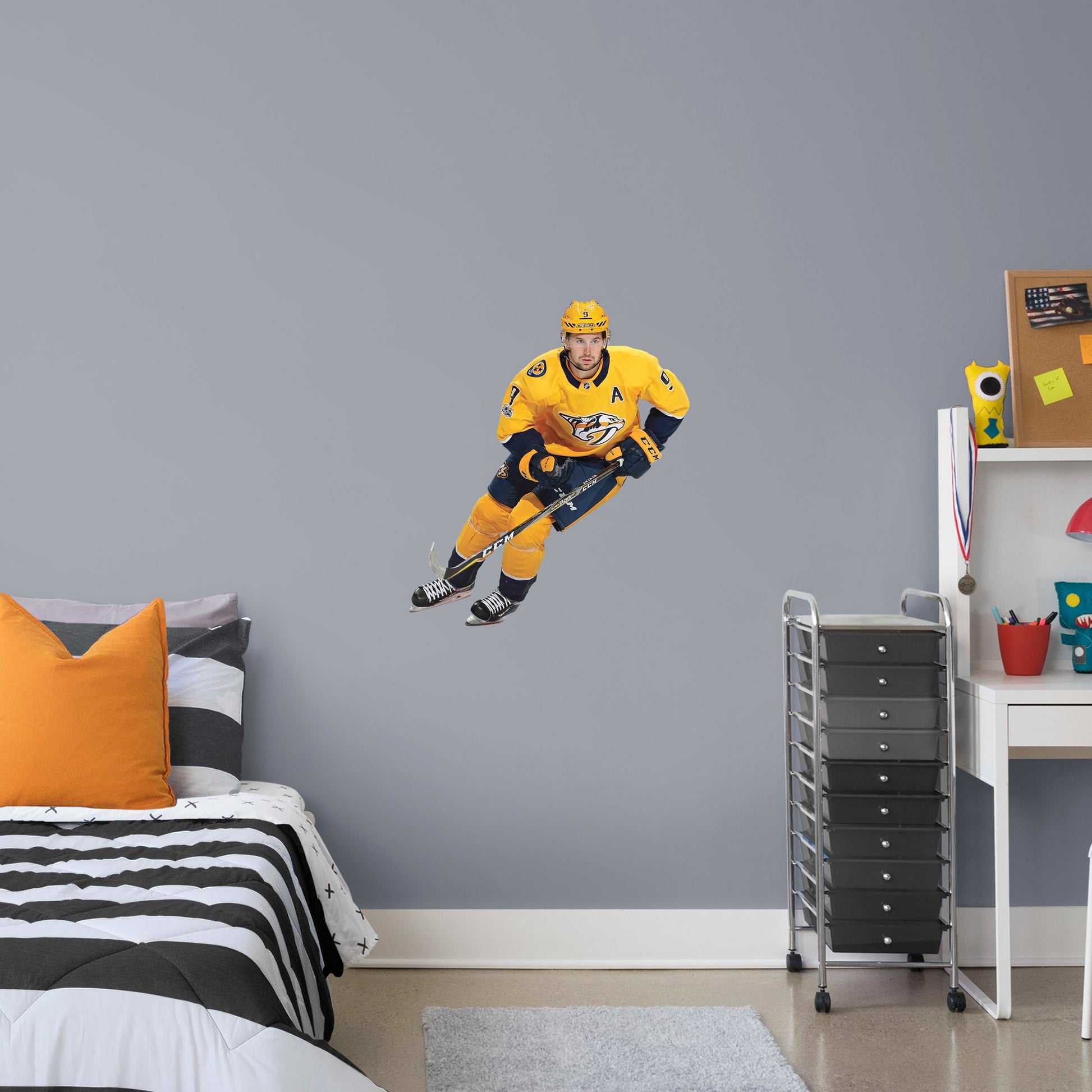 X-Large Athlete + 2 Decals (31"W x 35"H) Filip Forsberg has been a force in the NHL since he was first drafted in 2012 and now you can bring him to life in your home with this Officially Licensed NHL Removable Wall Decal! Pictured here in action on the ice, this durable and reusable wall decal is sure to standout in your bedroom, office, or fan room!