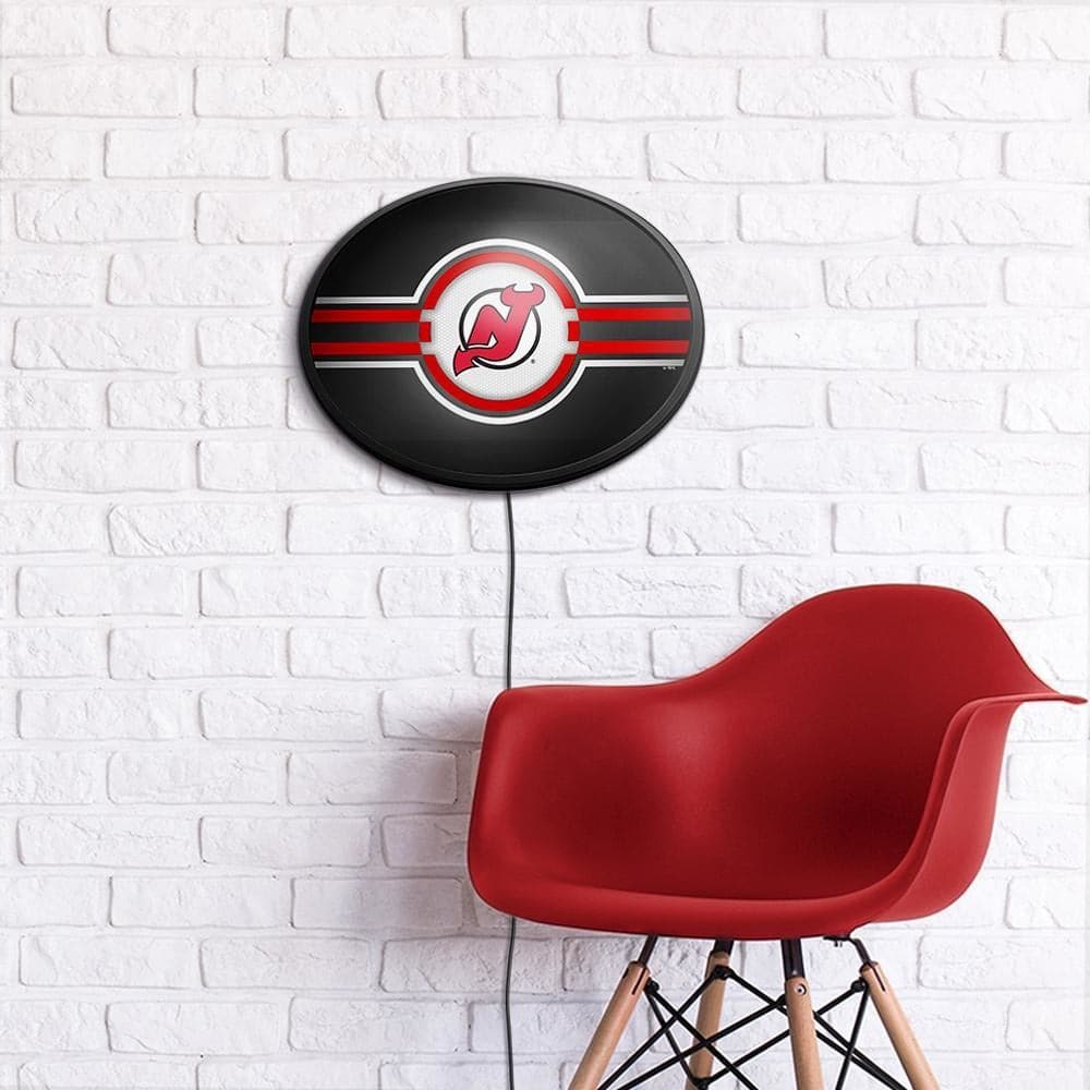 New Jersey Devils: Oval Slimline Lighted Wall Sign - The Fan-Brand