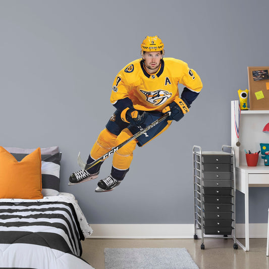 Life-Size Athlete + 2 Decals (61"W x 71"H) Filip Forsberg has been a force in the NHL since he was first drafted in 2012 and now you can bring him to life in your home with this Officially Licensed NHL Removable Wall Decal! Pictured here in action on the ice, this durable and reusable wall decal is sure to standout in your bedroom, office, or fan room!