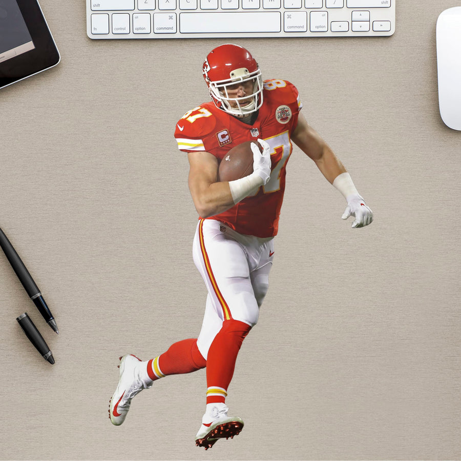 Bring the action of the NFL into your home with a wall decal of ! High quality, durable, and tear resistant, you'll be able to stick and move it as many times as you want to create the ultimate football experience in any room!