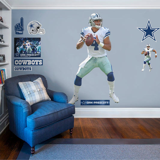 Life-Size Athlete + 10 Decals (43"W x 78"H) Make 4 your personal lucky number and remind yourself that anything is possible with a high-quality, life-sized Dak Prescott vinyl decal. Turn your favorite room, man cave, or playroom into Cowboys Stadium, complete with Prescott getting ready to throw for the touchdown. Count on this durable decal to be just as tough as your favorite quarterback - it's designed to be easily removed and reused over and over again.