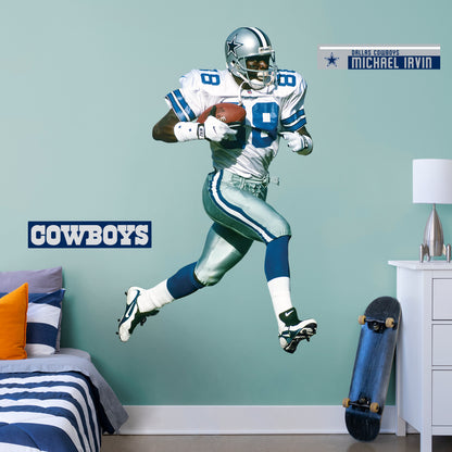 Life-Size Athlete + 2 Decals You can show off your love for NFL legend and Hall of Famer Michael Irvin with this high-quality wall decal. Wearing his iconic number 88 Dallas Cowboys jersey, this decal shows off The Playmaker leaving defenders in the dust! Luckily, you won't have to worry about trying to tackle Irvin yourself - this wall decal can be easily applied and removed from almost any surface. How 'bout them Cowboys?!