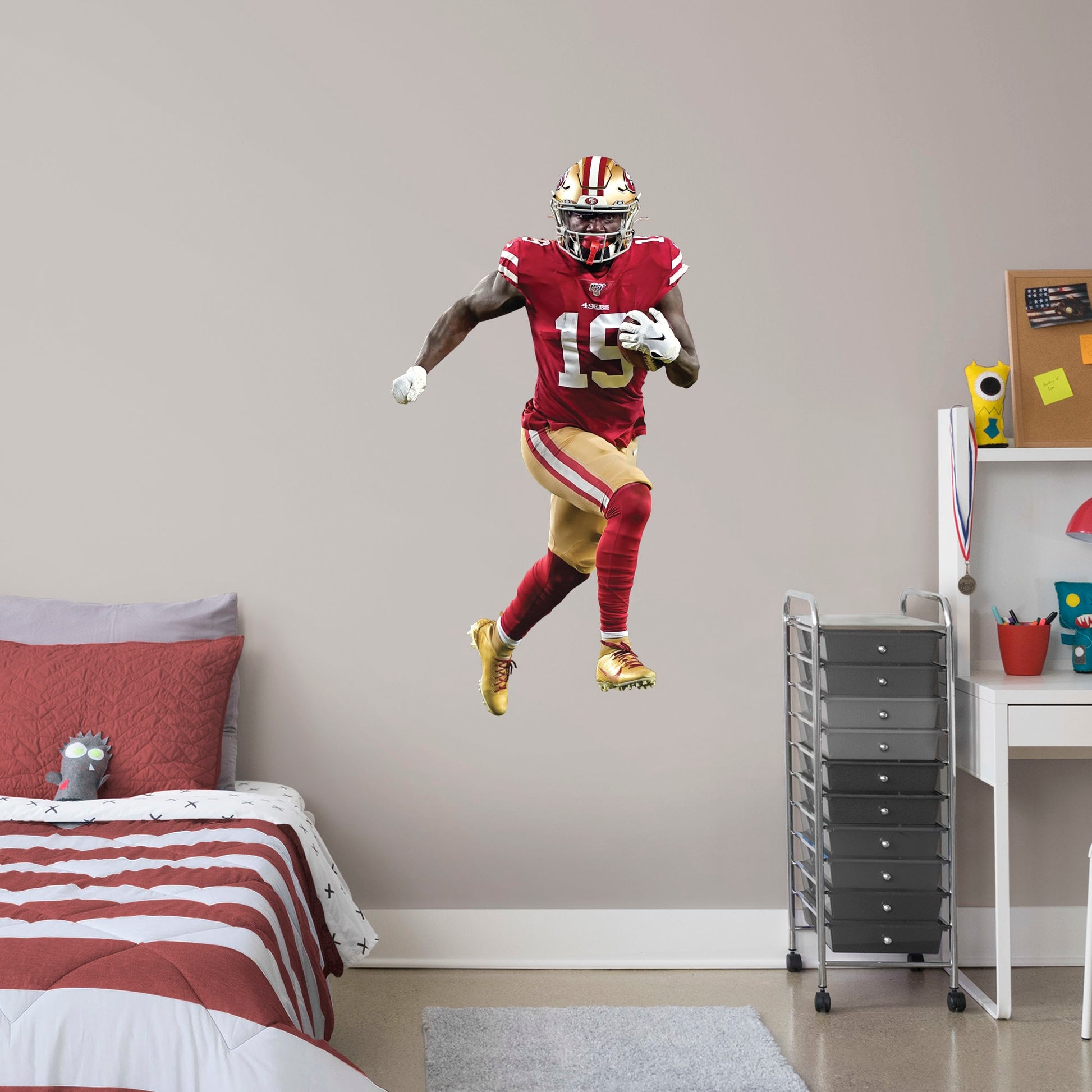 Giant Athlete + 2 Decals (28"W x 51"H) Deebo Samuel is one of the most exciting players in the NFL and you can show your support with this high-quality removable wall decal! Place this durable vinyl decal on any wall and wide receiver Deebo can dominate your room, office, or man cave like he helps the San Francisco 49ers dominate the league! This decal can be easily applied and removed on almost any surface, so this speedster can follow you everywhere you go! Let's go, Niners!